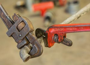Orange and black Pipe Wrench