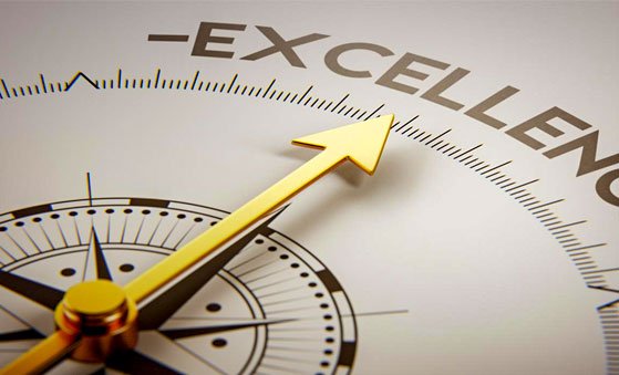 Compass pointing at Excellence